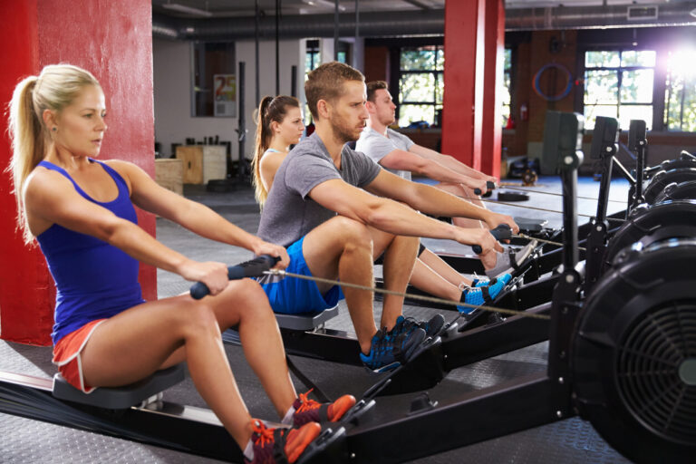 a group of people working out in a gym